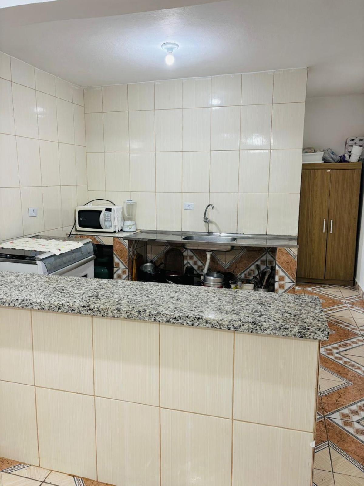 Com Piscina Em Condominio. 度假居 *